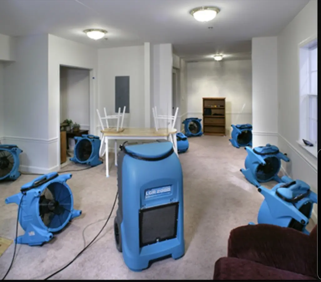 Air movers and dehumidifier setup for Water Damage Restoration in New Brighton